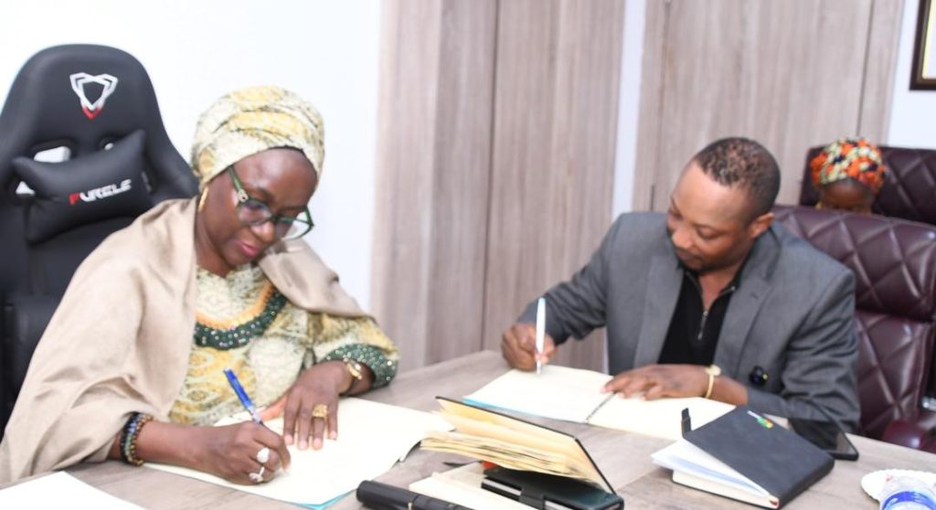 L-R: The Permanent Secretary, Federal Ministry of Youth Development (FMYD), Dr. Maryam Keshinro, and the Managing Director of Stratcomm Consulting, Dr. Kayode Olanorin, during the signing of the Memorandum of Understanding (MoU).